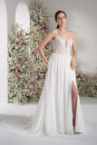 A-line Spaghetti Strap Deep V Sleeveless Lace Applique Wedding Dress With Court Train